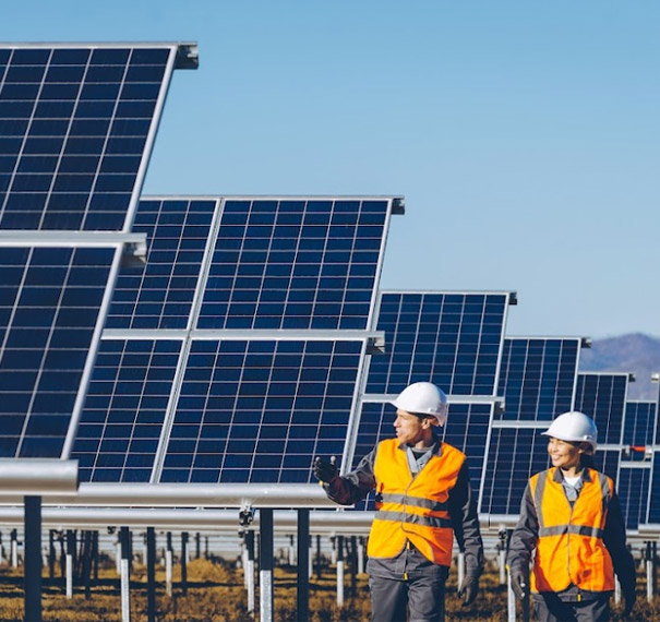Large Solar Power Panels and Workers