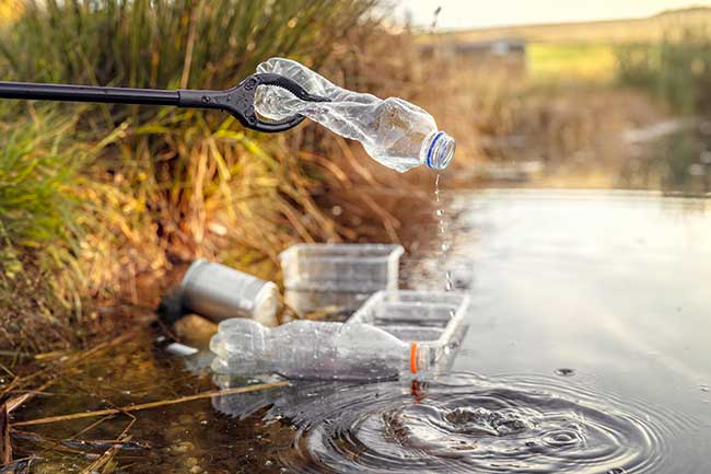 Water Pollution Garbage in Stream